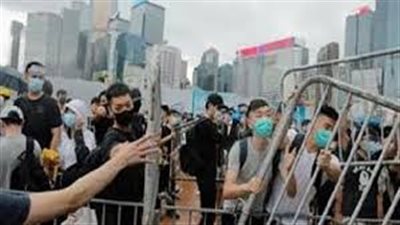 متظاهرو هونج كونج يطالبون التجار الصينيين بمغادرة المنطقة