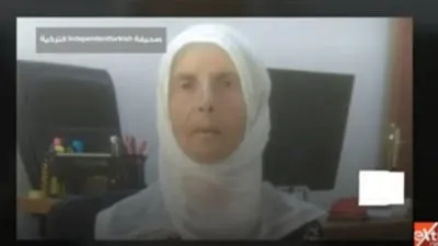 أردوغان يسجن عجوز عمرها 70 سنة بسبب لافتة 