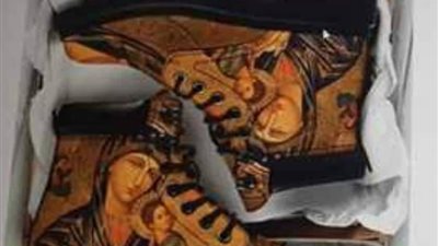 أول تعليق من الكنيسة على وضع صورة العذراء مريم على الأحذية