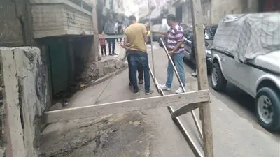 انهيار جزئي لعقار دون إصابات في الإسكندرية (صور)