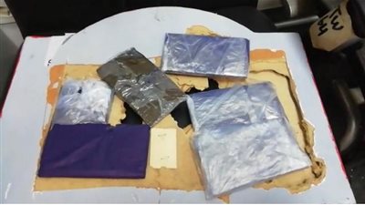 ضبط طرد محشو بـ6 قطع حشيش في مطار القاهرة