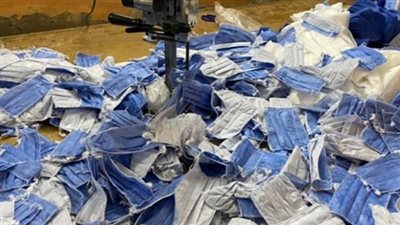 العثور على 30 ألف كمامة مجهولة المصدر داخل شقة بالعمرانية