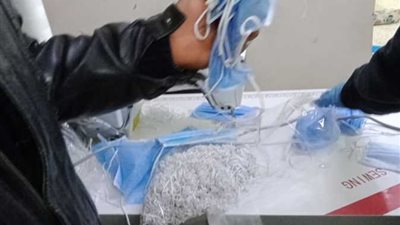 حجز طالب وربة منزل لتصنيعهما كمامات مجهولة بالعمرانية