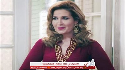 هنا شيحة تحتفل بتخرج ابنها بحضور والدها