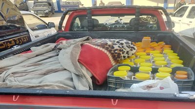 ضبط 300 زجاجة زيت تمويني محظور وربع طن عسل مغشوش ببني سويف