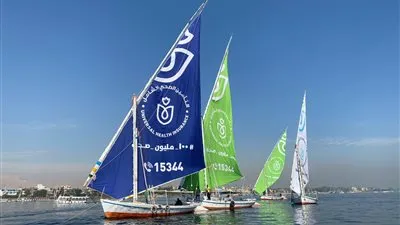 في اليوم العالمي للتغطية الصحية الشاملة.. شعار التأمين الشامل يزين المراكب الشراعية بنهر النيل 