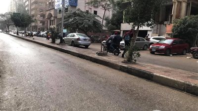الأمطار تفاجئ المواطنين في شوارع القاهرة (صور)