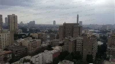 شاهد.. أمطار غزيرة بشوارع القاهرة والجيزة (صور)
