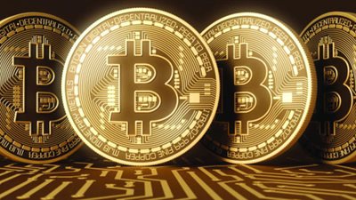 البيتكوين يتجاوز الـ 57 ألف دولار خلال التعاملات