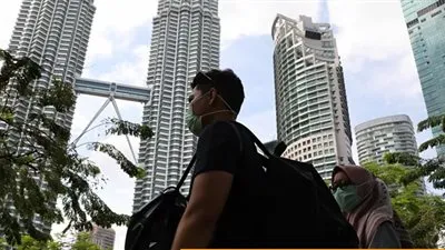 ماليزيا تسجل 9353 إصابة جديدة بفيروس كورونا