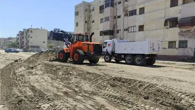 استمرار أعمال تطوير شارع 23 ديسمبر في بورسعيد (صور)