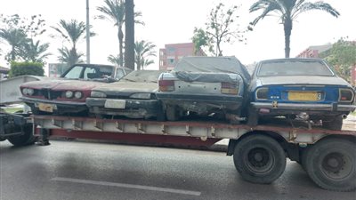 رفع الإشغالات لتيسير حركة السيارات بمحيط سوق العصر في بورسعيد