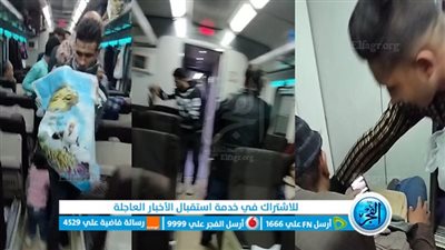 شباب بني سويف يوزعون وجبات على القطارات المتوقفة والمتأخرة بسبب الأمطار