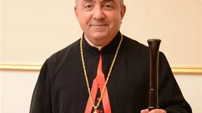 المطران شيحان يهنئ السيسي وأم الشهيد بعيد الشرطة