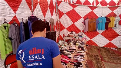  توزيع ألفي قطعة ملابس على الأسر الأكثر احتياجًا بالبحيرة (صور) 