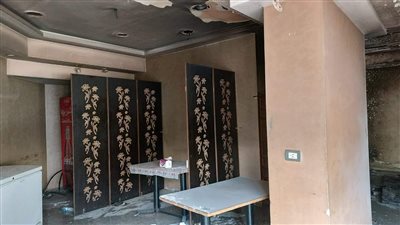 حروق واختناقات وكسور.. حالة مصابي حريق مطعم شهير للمأكولات اليمنية بالدقي 