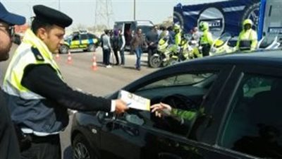 حملات مكبرة بالقاهرة والجيزة لتحرير المخالفات المرورية