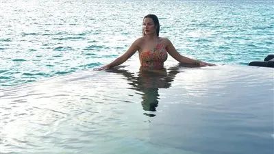 نادين نجيم وخطيبها يثيران الجدل بصورهما في جزر المالديف