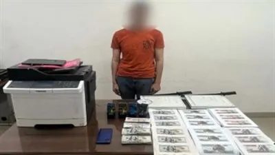 ضبط شخص تخصص في مجال تقليد العملات المالية وترويجها بالجيزة