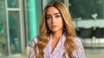 هنا الزاهد تكشف سر ارتدائها ملابس ماركات مقلدة