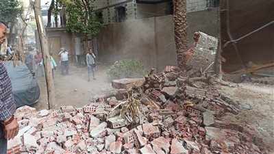 محافظة الجيزة تعيد فتح شارع بالعمرانية أغلقه سكان أحد العقارات بالأسوار