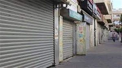 تحرير199 مخالفة للمحلات التى لم تلتزم بقرار الغلق 