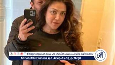 ريهام حجاج ترد على شائعات حملها بصورة قديمة مع زوجها