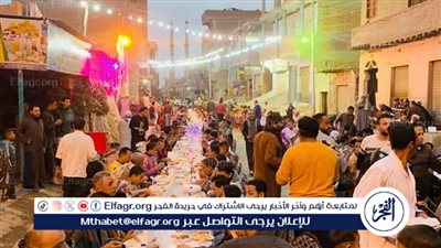 أهالي قرية الروبيات بالفيوم يجتمعون على مائدة إفطار رمضانية بحضور رئيس المركز