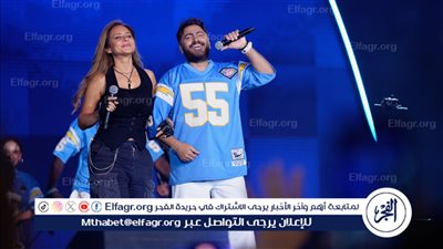 نيللي كريم برفقة تامر حسني على المسرح لغناء 'بنت الايه' | صور 