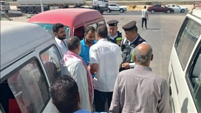 ضبط 12 مخالفة لمركبات السرفيس وإلغاء موقف عشوائي بكرداسة ضمن حملة مكبرة