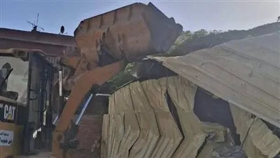 ازالة جمالون مخالف داخل جراج بشارع ربيع الجيزي وحملات لرفع التعديات من شوارع برادة والمحطة بجنوب الجيزة